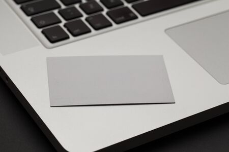 Business card on a notebookの写真素材