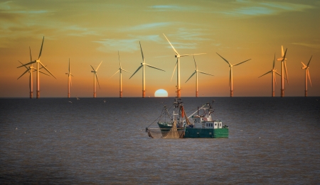 fishing boat and wind turbinesの写真素材