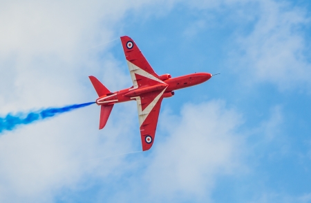 Cleethorpes, England - July 28, 2013: Royal Air Force aerobatic display team The Red Arrows put on a display at the Cleethorpes airshow.のeditorial素材