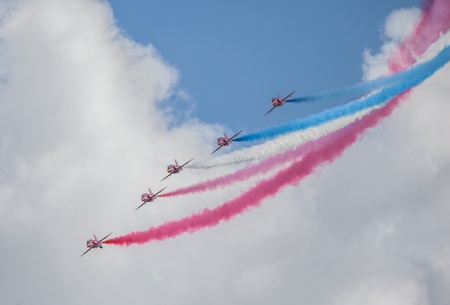 Cleethorpes, England - July 28, 2013: Royal Air Force aerobatic display team The Red Arrows put on a display at the Cleethorpes airshow.のeditorial素材