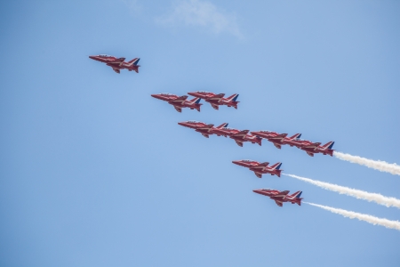 Cleethorpes, England - July 28, 2013: Royal Air Force aerobatic display team The Red Arrows put on a display at the Cleethorpes airshow.のeditorial素材
