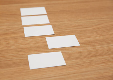 Business card pile on desk
