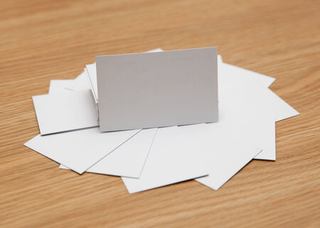 Business card pile on deskの写真素材