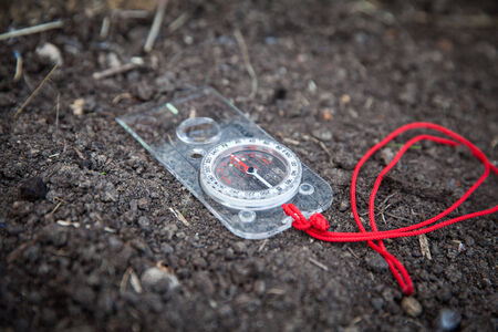 Shot of Orienteering compass on stringの写真素材