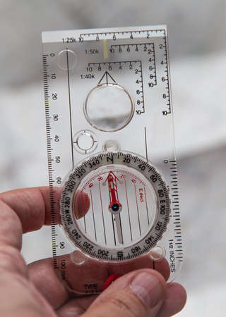 Shot of Orienteering compass on stringの写真素材