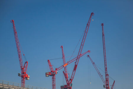 Tall cranes building の写真素材