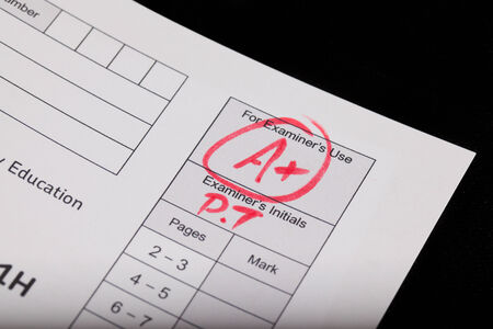A plus on an exam paperの写真素材