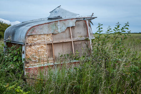Old caravan in lincolnshire with view of woldsの写真素材