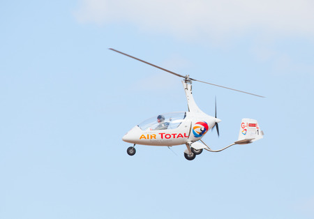 CLEETHORPES, ENGLAND JULY 27TH: A Gyrocopter performs an aerobatic display at Cleethropes airshow on 27th July 2014 in Cleethorpes England.のeditorial素材