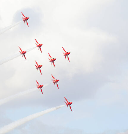 CLEETHORPES, ENGLAND JULY 27TH: Royal Air Force Red arrows perform an aerobatic display at Cleethropes airshow on 27th July 2014 in Cleethorpes England.のeditorial素材