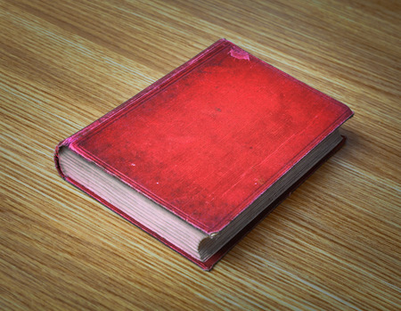 Very old books on desk, books are around 100 years oldの写真素材