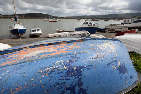 fishing boats moored up in fishing village uk