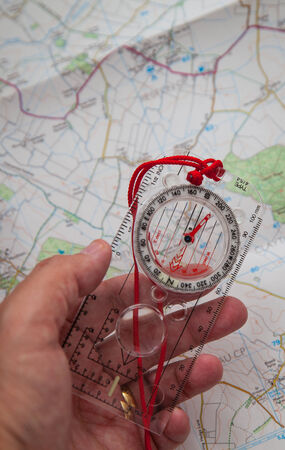 Shot of Orienteering compass on string
