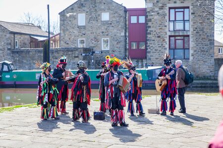 SKIPTON ENGLAND APRIL 6TH: Morris dancers put on a public display with dancing in Skipton on 6th April 2015 in Skipton England.のeditorial素材