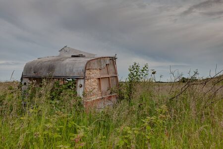 Old caravan in lincolnshire with view of woldsの写真素材