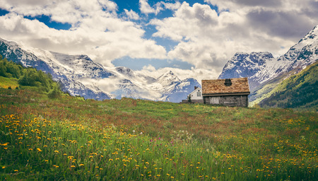 norwegian fjord with moutains and waterの写真素材
