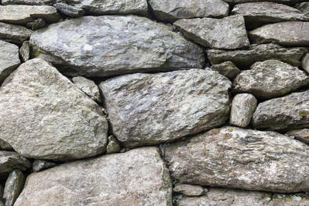 Stone wall background picture shotの写真素材