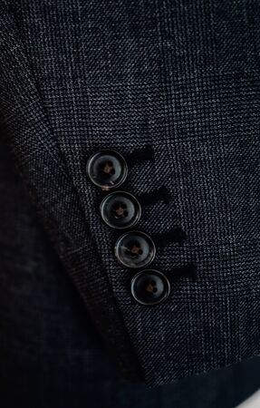 close up of a business suit button detailの写真素材