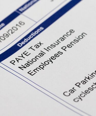 Payslip and money close up shotの写真素材