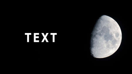 Moon on a black background. Black background. Moon. For business cards, place for text, banner.の写真素材