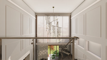 Vintage style staircase landing with wainscoting walls modern pendant chandelier and large windowの写真素材