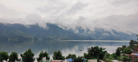 Breezy Shores and Annapurna Mountain Peaks at Phewa Lakeの写真素材