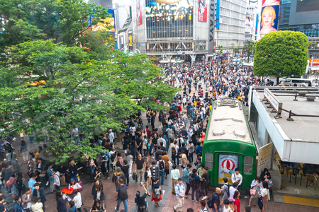 Shibuya, Tokyo, Japan - April 30, 2018: Pedestrians crosswalk at Shibuya district in Tokyo, Japan. Shibuya Crossing is one of the busiest crosswalks in the world.のeditorial素材