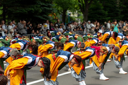 YOSAKOI Soran Festival. Powerful dance performances parade in Odori Park, Sapporo City. Many teams showcase the original dance. A very popular festival for tourists.のeditorial素材