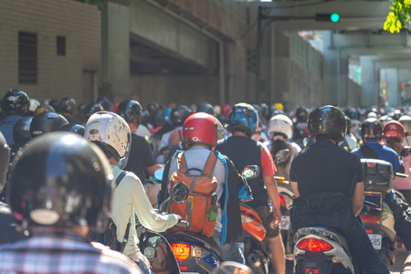 Taipei, Taiwan : 21 June 2019, Scooter waterfall in Taiwan. Traffic jam crowded of motorcycles at rush hour on the ramp of Taipei Bridge, Cascade of scooters on Minquan West Road in Datong Districtのeditorial素材