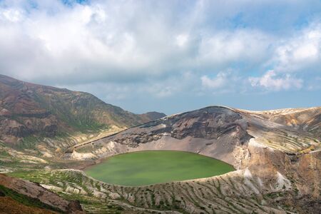 Beautiful view of Okama crater lake at Mount Zao in summer sunny day. active volcano in Miyagi Prefecture, Japanの写真素材
