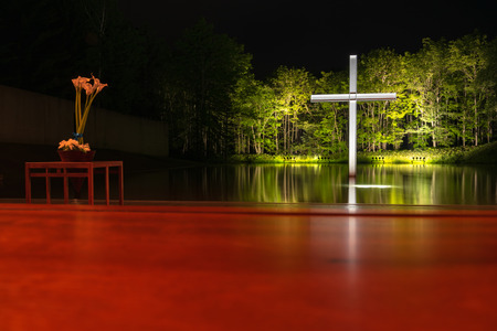 Church on the Water or Chapel on the Water, a large window faces a reflecting pool. design by Japanese modernist architect Ando Tadao. Hoshino Resort Tomamu, Shimukappu, Hokkaido, Japanのeditorial素材