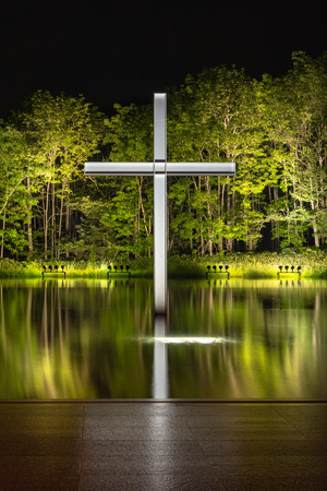 Church on the Water or Chapel on the Water, a large window faces a reflecting pool. design by Japanese modernist architect Ando Tadao. Hoshino Resort Tomamu, Shimukappu, Hokkaido, Japanのeditorial素材