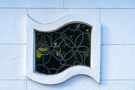 The side wall window of traditional buildingの写真素材
