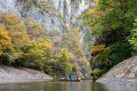 Geibikei Gorge River Cruises in Autumn foliage season. Beautiful scenery landscapes view in sunny weather day. Ichinoseki, Iwate Prefecture, Japanのeditorial素材