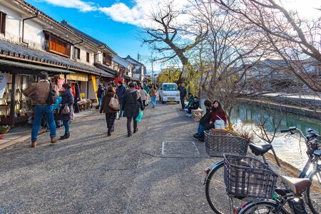 View of Kurashiki Bikan Historical Quarter. Townscape known for characteristically Japanese white walls of residences and willow trees lining banks of Kurashiki River , Okayama, Japanのeditorial素材