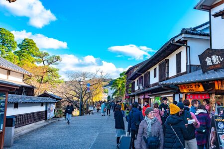 View of Kurashiki Bikan Historical Quarter. Townscape known for characteristically Japanese white walls of residences and willow trees lining banks of Kurashiki River , Okayama, Japanのeditorial素材