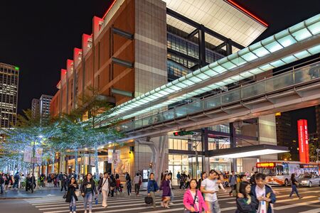 Night view of Xinyi Special Commercial Center, Department Stores, Hotel, Restaurant Clustered Close Together . The prime central business district of Taipei, Taiwanのeditorial素材