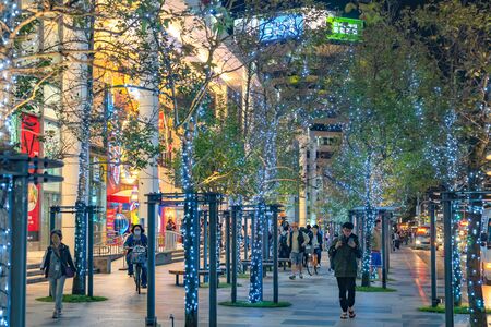 Night view of Xinyi Special Commercial Center, Department Stores, Hotel, Restaurant Clustered Close Together . The prime central business district of Taipei, Taiwanのeditorial素材