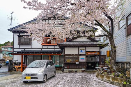 Street view of Kakunodate in springtime cherry blossom season sunny day morning. Kakunodate is famous by the Bukeyashiki (samurai residences). Semboku District, Akita Prefecture, Japan