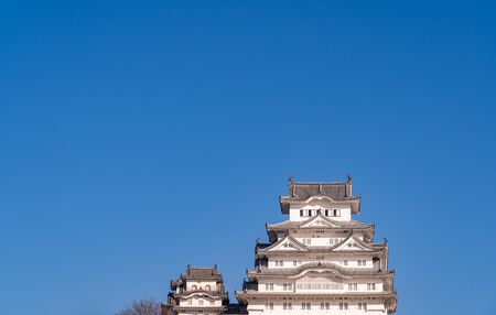 Himeji Castle in clear blue sky sunny day, as known as Hakuro-jo or Shirasagi-jo (White Egret or White Heron Castle), popu lar sightseeing spot in Kansai region, Hyogo Prefecture, Japanのeditorial素材