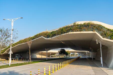 Street view of Shuinan Economic and Trade Area in blue sky sunny day. Former Shuinan Airport, lot of green space in here. Xitun District, Taichung City, Taiwanのeditorial素材