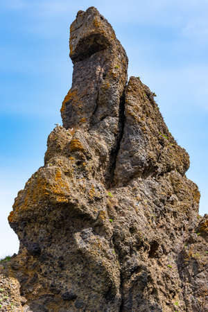 Godzilla Rock, A Rock That Looks Like a Monster Godzilla at Utoro Fishing Port, Utoronishi. Town Shari, Shiretoko Peninsula, Hokkaido, Japanのeditorial素材