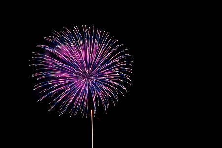 Beautiful colorful fireworks sparkle in night skyの写真素材