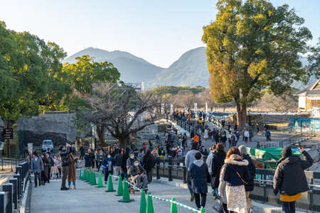 Tourists visiting Kumamoto Castle in New Year holiday. The castle sustained damage in earthquake on...