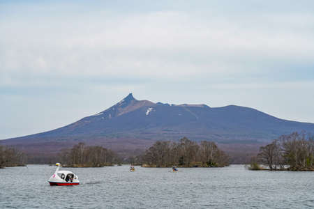 Scenery view from Lake Onuma with Mt. Hokkaido Koma-ga-take in background. Onuma Quasi-National Park. Town Nanae, Oshima Subprefecture, Hokkaido, Japanのeditorial素材