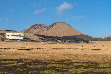 Kusasenri (kusasenri-ga-hama) prairie in Aso Kuju National Park. Aso Volcano Museum, shops, cafe, and restaurant are adjoining the large parking area. Kumamoto Prefecture, Japanのeditorial素材
