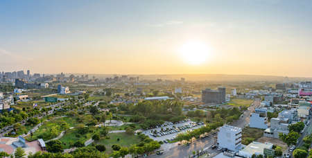 Taichung Central Park. Modern city skyline in sunset time with colourful sky background. Xitun District Shuinan Economic and Trade Area. Former Shuinan Airport. Taichung City, Taiwanのeditorial素材
