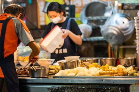 Feng Chia Night Market, famous travel destination. People can seen walking and exploring around it. Big part of Taiwanese culture. Xitun district, Taichung city, Taiwanのeditorial素材