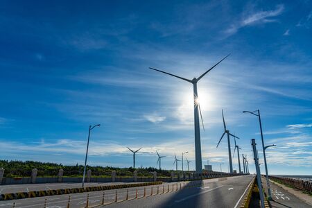 Wind turbines in Taichung Port Gaomei Wetlands Area. A popular scenic spots in Qingshui District, Taichung City, Taiwanの写真素材