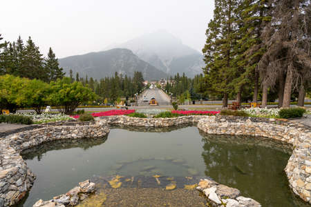 Banff, Alberta, Canada-SEP 14 2020: Downtown Banff Avenue as a haze. Smoke from the forest wildfires. Poor air quality.のeditorial素材